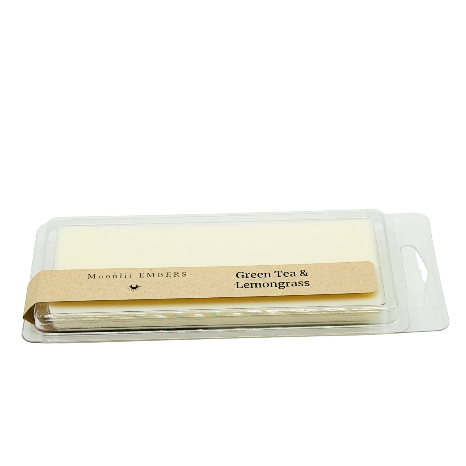 Candle in packaging with 'Green Tea & Lemongrass' label on a white background

